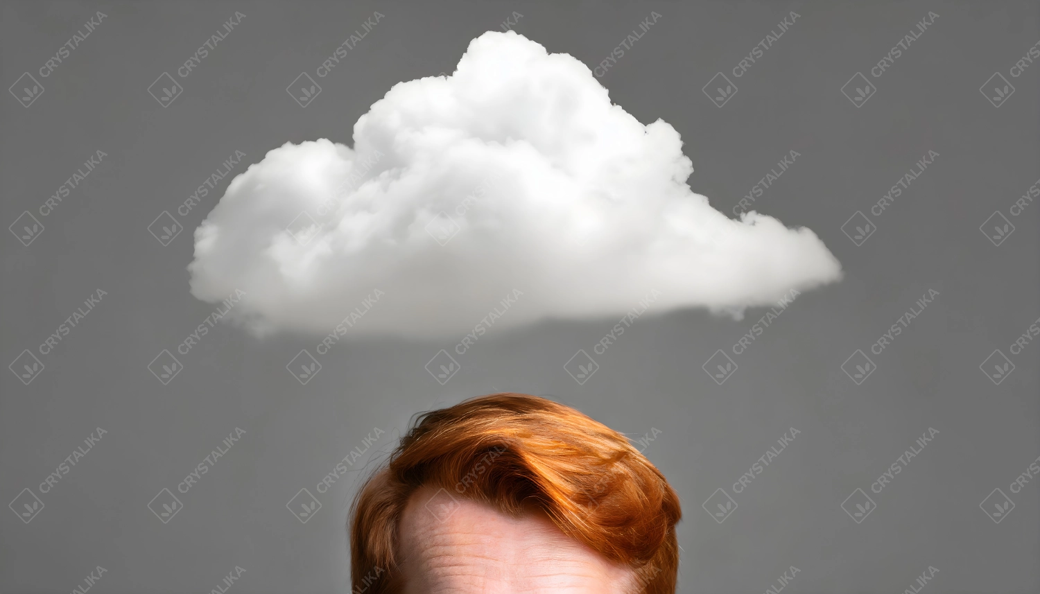 Man's forehead and red hair visible under a white cloud.