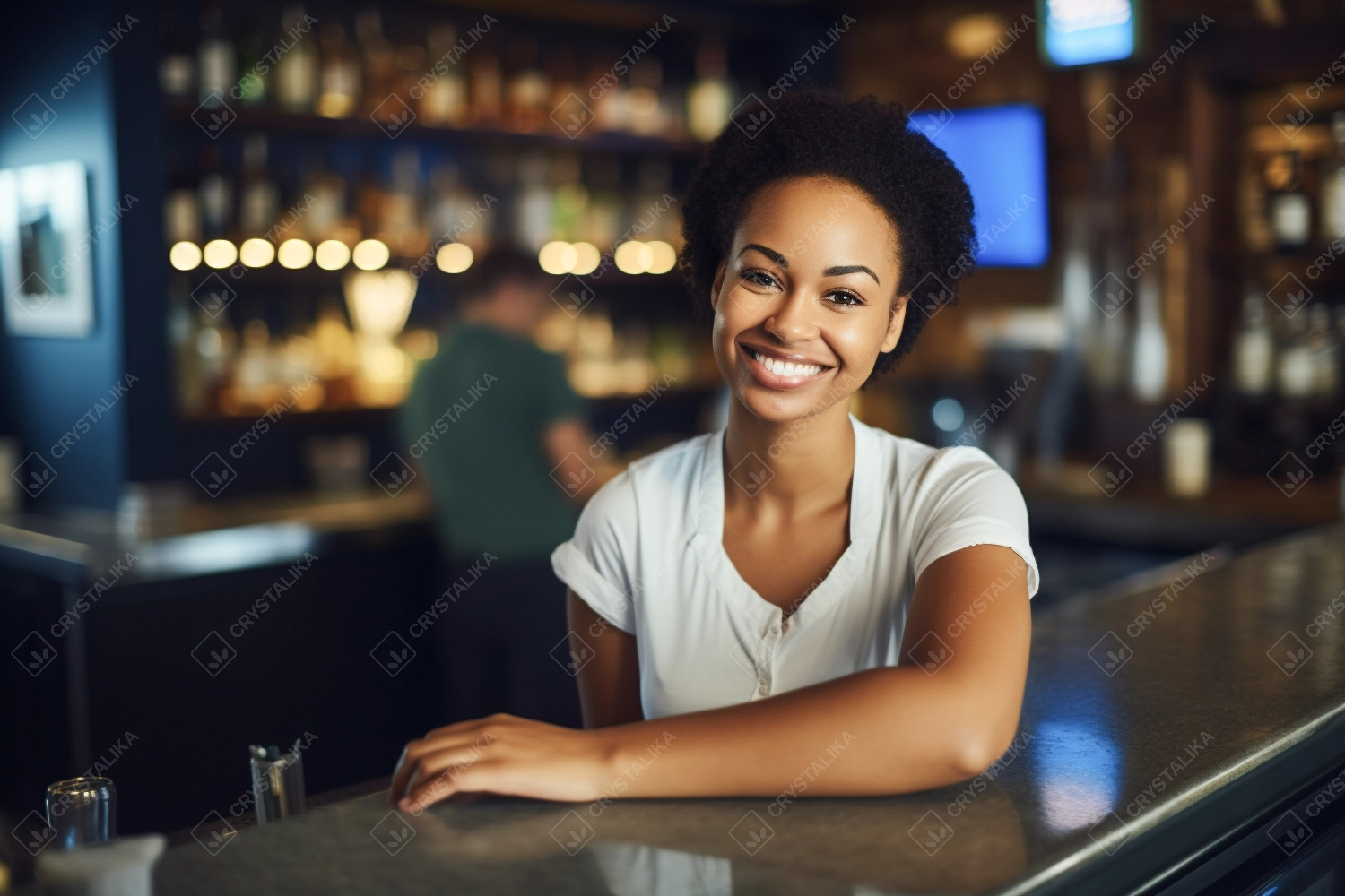 Portrait of happy young woman who works as a bartender at bar. Beautiful waitress or small business owner barista bartender standing at the bar counter in restaurant.