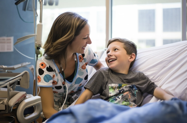 Smiling mother and son at hospital - Mom and son celebrate good medical healthcare treatment result