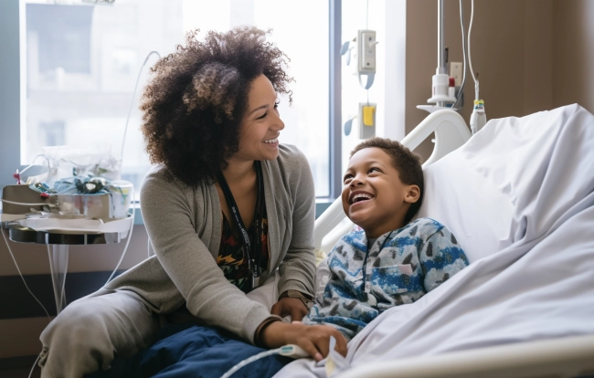 Smiling mother and son at hospital- Mom helping son during hospitalization